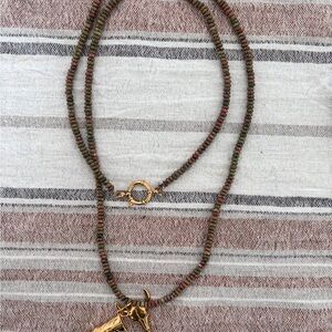 Elegant Beaded Necklace with Gold Accents